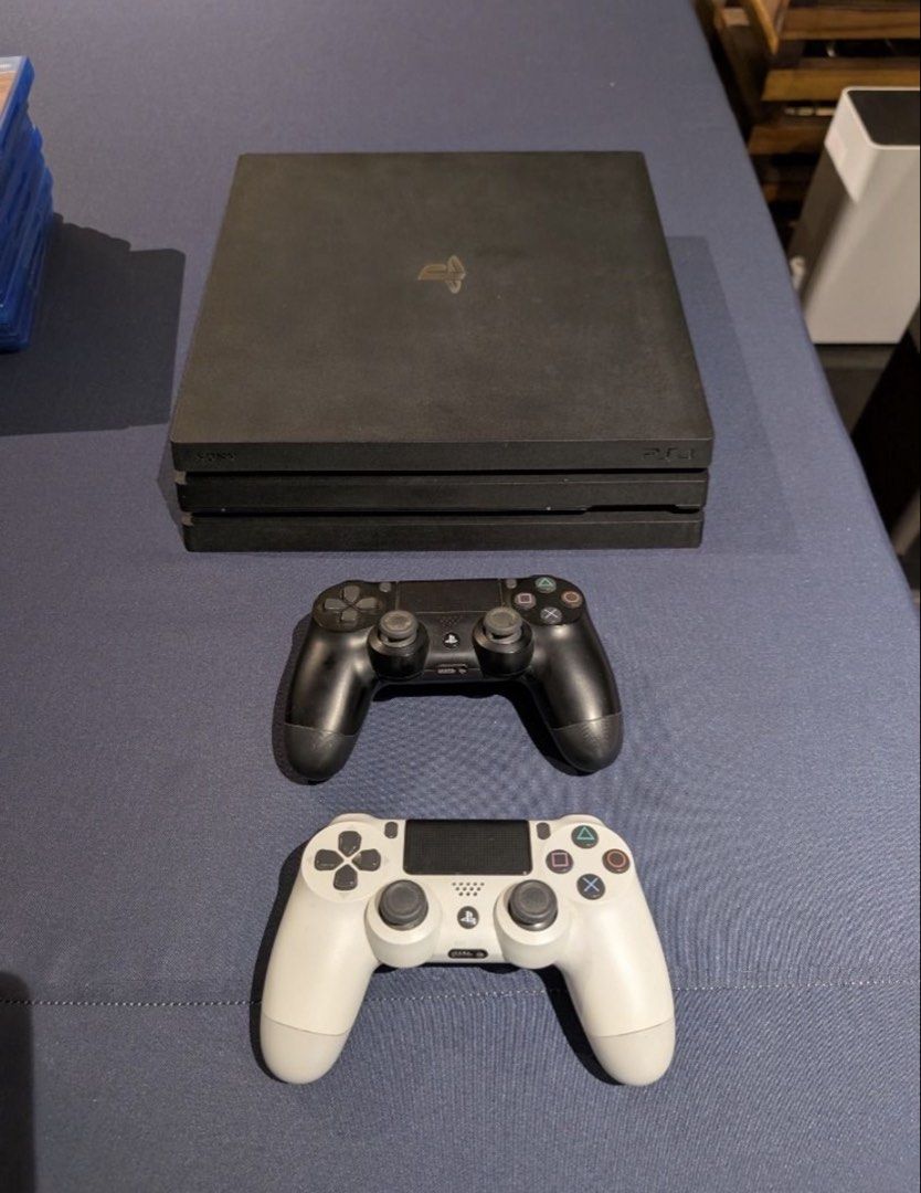 Sony PlayStation 4 Pro Console with 2 Controllers & Games (Category: PlayStation) located in Taguig. Submitted by bashl (Listing ID 1442590286, Image 1). Description: Excellent Condition PS4 Pro 1TB - Single Owner - Includes 8 Amazing Games! Cash / GCash / MBT / BPI upon pickup. Available for pick up in BGC between June 9-10! Up for sale is a meticulously cared-for PlayStation 4 Pro 1TB console in fantastic, near-mint condition. This has been adu