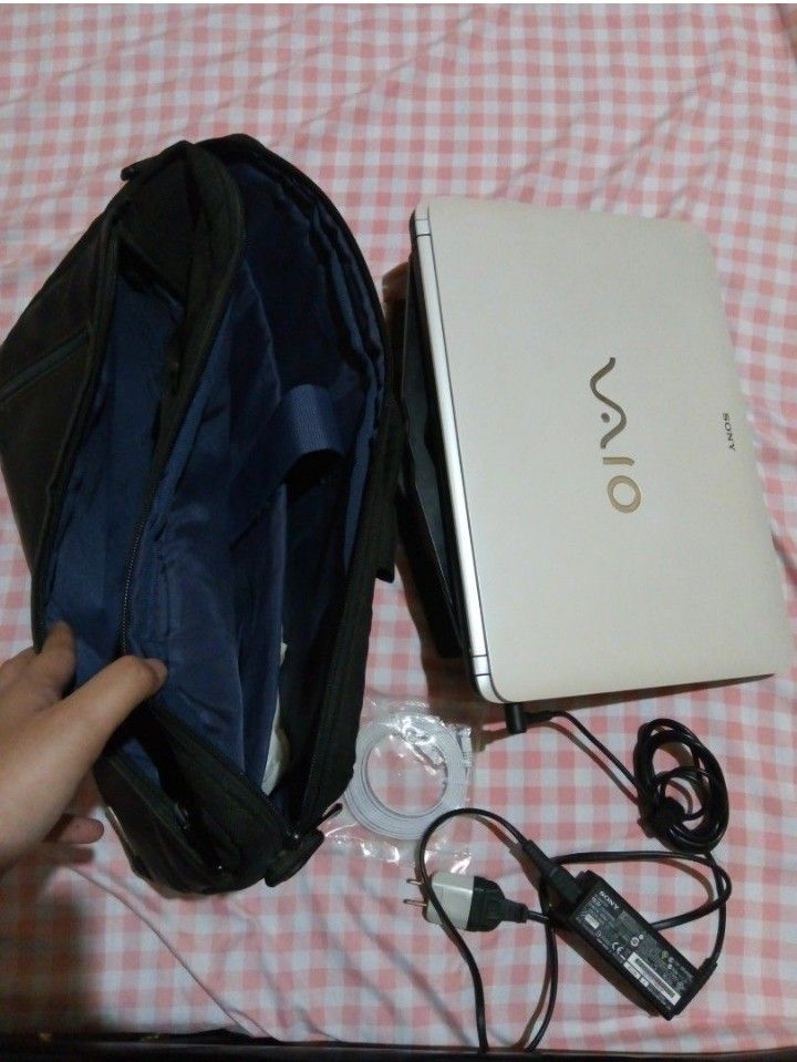 Sony VAIO Laptop (Category: Laptops & Notebooks) located in Lipa City. Submitted by bookshaven (Listing ID 1442721713, Image 3). Description: Sony VAIO laptop (white) -Windows 8 -already reset -comes with original charger and accessories -free black laptop bag w/ multiple compartments -honest issue: battery, need nakasaksak to use -can provide free ms office download.