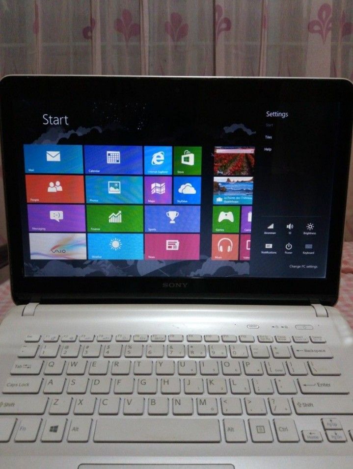 Sony VAIO Laptop (Category: Laptops & Notebooks) located in Lipa City. Submitted by bookshaven (Listing ID 1442721713, Image 2). Description: Sony VAIO laptop (white) -Windows 8 -already reset -comes with original charger and accessories -free black laptop bag w/ multiple compartments -honest issue: battery, need nakasaksak to use -can provide free ms office download.