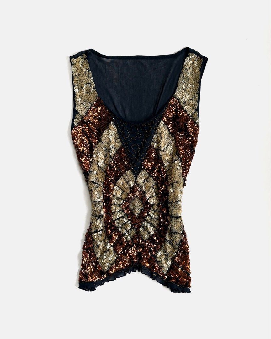 Sparkly Beaded Tank Top - Bronze & Gold (Category: Sleeveless) located in Tarlac. Submitted by kr_closet (Listing ID 1442727167, Image 1). Description: - Eye-catching bronze and gold sequins in a diamond pattern - Flattering V-neckline - Sleeveless design - Sheer black fabric on upper chest and back for a touch of allure - Trendy lettuce hem detail - Ideal for parties, nights out, or any special occasion.