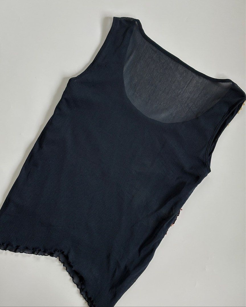Sparkly Beaded Tank Top - Bronze & Gold (Category: Sleeveless) located in Tarlac. Submitted by kr_closet (Listing ID 1442727167, Image 3). Description: - Eye-catching bronze and gold sequins in a diamond pattern - Flattering V-neckline - Sleeveless design - Sheer black fabric on upper chest and back for a touch of allure - Trendy lettuce hem detail - Ideal for parties, nights out, or any special occasion.