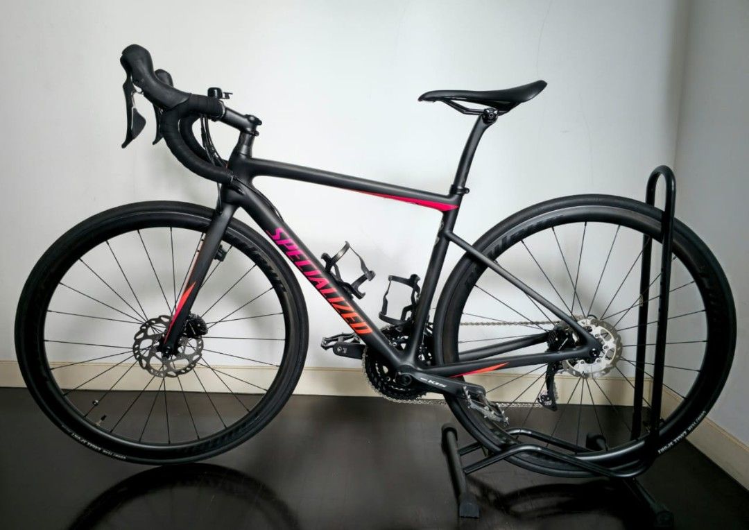 Specialized Tarmac SL6 Disc Sport Road Bike (Category: Bicycles) located in Singapore. Submitted by guacamoleeee (Listing ID 1442663322, Image 1). Description: - Lightweight FACT 9r carbon - Specific geomet ry, for power transfer, climbing and comfort during long rides - Frame Size 49, suitable for height 155cm to 163cm Color: Gloss Acid Purple-Acid Lava on Satin Carbon Seat Post: S-Works FACT carbon Brakes: Shimano 105 hydraulic disc brakes Whee