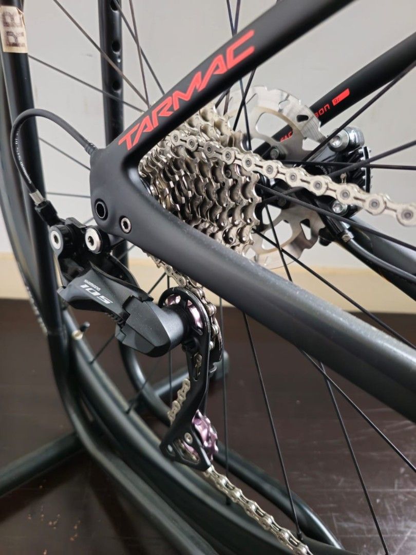 Specialized Tarmac SL6 Disc Sport Road Bike (Category: Bicycles) located in Singapore. Submitted by guacamoleeee (Listing ID 1442663322, Image 2). Description: - Lightweight FACT 9r carbon - Specific geomet ry, for power transfer, climbing and comfort during long rides - Frame Size 49, suitable for height 155cm to 163cm Color: Gloss Acid Purple-Acid Lava on Satin Carbon Seat Post: S-Works FACT carbon Brakes: Shimano 105 hydraulic disc brakes Whee