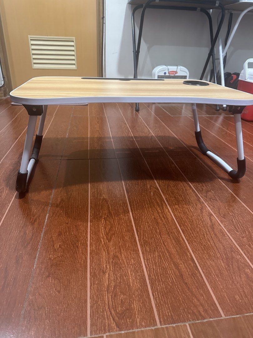 Study Table (Category: Kids Tables & Chairs) located in Paranaque City. Submitted by thriftclothing101 (Listing ID 1442664229, Image 2). Description: - Foldable study table - Wood grain finish - Built-in cup holder - Tablet/phone slot - Ideal for study, work, or leisure.