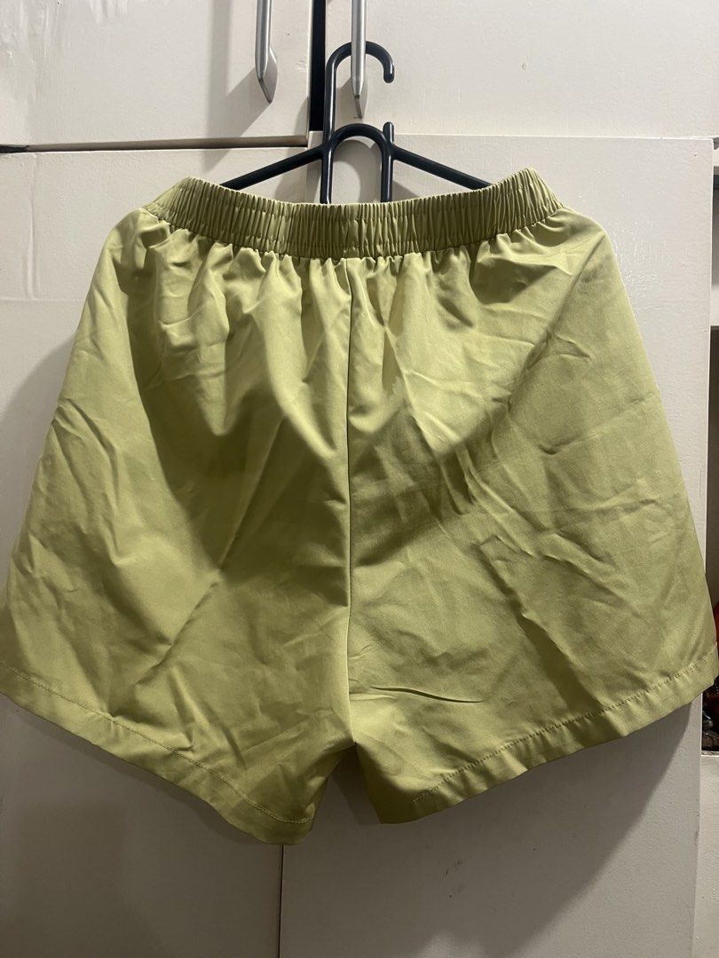 Sumwon Shorts Size S Light Green with Black Stripes (Category: Shorts) located in Cagayan de Oro. Submitted by everythingpreloved__ (Listing ID 1442688311, Image 2). Description: - Brand: Sumwon - Color: Light Green - Stripes: Black on sides - Waistband: Elastic for comfort - Pockets: Two side pockets - Size: S - Origin: Made in China - Ideal for: Casual wear or sports.
