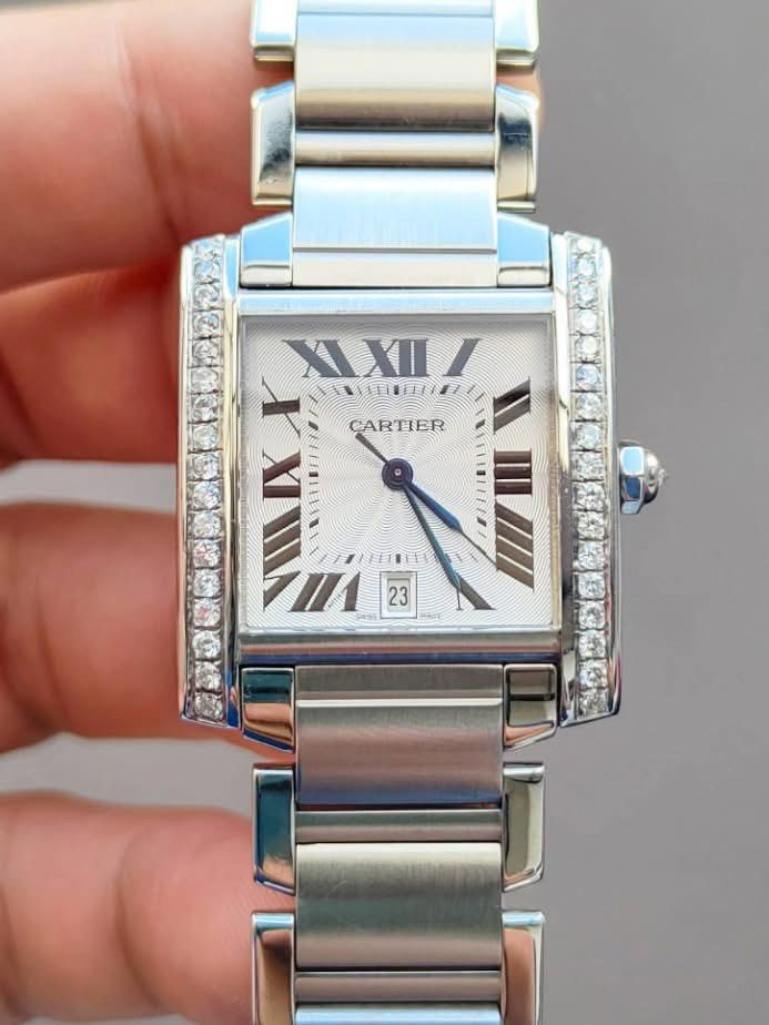 TANK FRANÇAISE LARGE AUTOMATIC DIAMOND BEZEL ✨ (Category: Luxury Watches) located in Manila. Submitted by kristinepenafiel (Listing ID 1442648532, Image 2). Description: TANK FRANÇAISE LARGE AUTOMATIC DIAMOND BEZEL ✨ ₱228,000 ✔️Complete Set ✔️Automatic Movement ✔️Diamond Bezel Model: Cartier 2302 ✨Case Size: 32mm × 28mm ✨White Roman Dial ✨Condition: 9/10 An elegant Tank Française Large Automatic, enhanced with a stunning diamond bezel that adds e