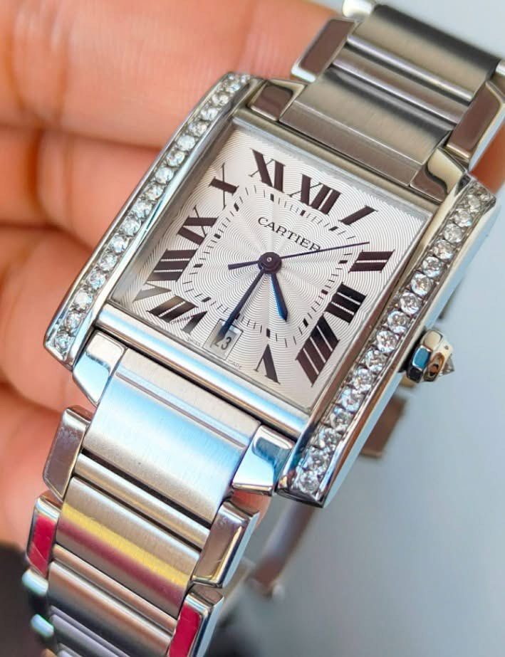 TANK FRANÇAISE LARGE AUTOMATIC DIAMOND BEZEL ✨ (Category: Luxury Watches) located in Manila. Submitted by kristinepenafiel (Listing ID 1442648532, Image 1). Description: TANK FRANÇAISE LARGE AUTOMATIC DIAMOND BEZEL ✨ ₱228,000 ✔️Complete Set ✔️Automatic Movement ✔️Diamond Bezel Model: Cartier 2302 ✨Case Size: 32mm × 28mm ✨White Roman Dial ✨Condition: 9/10 An elegant Tank Française Large Automatic, enhanced with a stunning diamond bezel that adds e