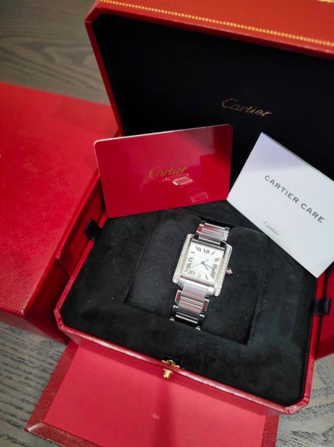 TANK FRANÇAISE LARGE AUTOMATIC DIAMOND BEZEL ✨ (Category: Luxury Watches) located in Manila. Submitted by kristinepenafiel (Listing ID 1442648532, Image 3). Description: TANK FRANÇAISE LARGE AUTOMATIC DIAMOND BEZEL ✨ ₱228,000 ✔️Complete Set ✔️Automatic Movement ✔️Diamond Bezel Model: Cartier 2302 ✨Case Size: 32mm × 28mm ✨White Roman Dial ✨Condition: 9/10 An elegant Tank Française Large Automatic, enhanced with a stunning diamond bezel that adds e