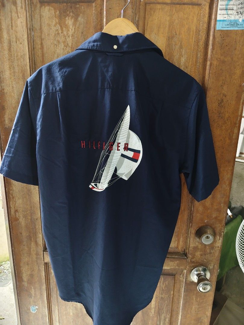 Tommy Hilfiger Nautical Sailboat Racing Men's Button Down (Category: Tshirts & Polo Shirts ) located in Iloilo. Submitted by branded-boy0422_16 (Listing ID 1442584183, Image 2). Description: small on tag Fits Large Width: 20-21 1/2 L:30/31 Good as new need washed only.