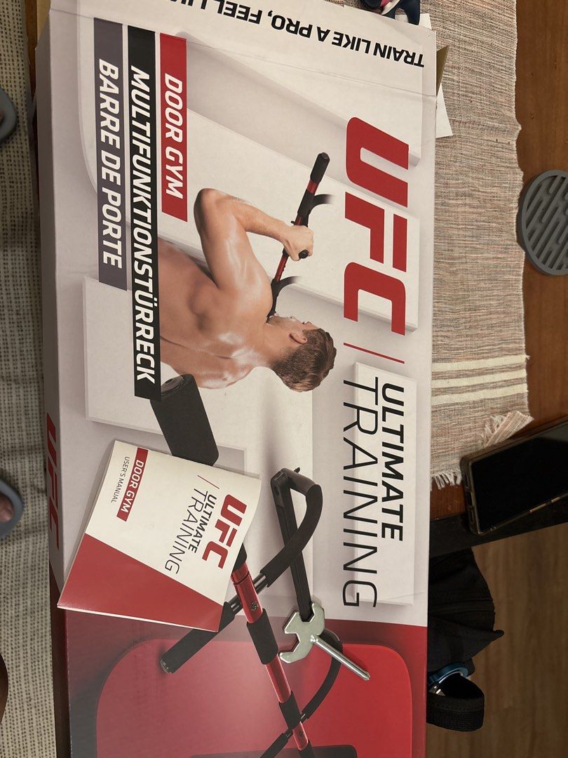 UFC Ultimate Training Door Gym Pull Up Bar (Category: Weights & Dumbbells) located in Hinigaran. Submitted by spebbit (Listing ID 1442691287, Image 1). Description: - UFC Ultimate Training Door Gym - Mounts securely on your door frame - Perfect for pull-ups and various home exercises - Features comfortable foam grips - Comes with manual and all necessary mounting hardware - Ideal for convenient home workouts.