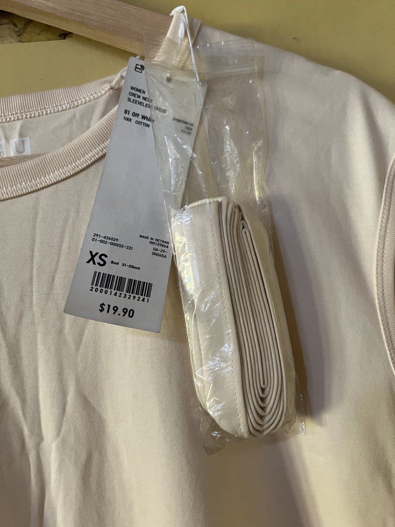 Uniqlo dress (Category: Dresses) located in Makati City. Submitted by hersh01 (Listing ID 1442583001, Image 2). Description: - Uniqlo Sleeveless Dress Brandnew - Color: Off White - Material: 100% Cotton - Size: XS (can fit small and med) - Includes matching belt - Versatile design: great for layering or wearing on its own.