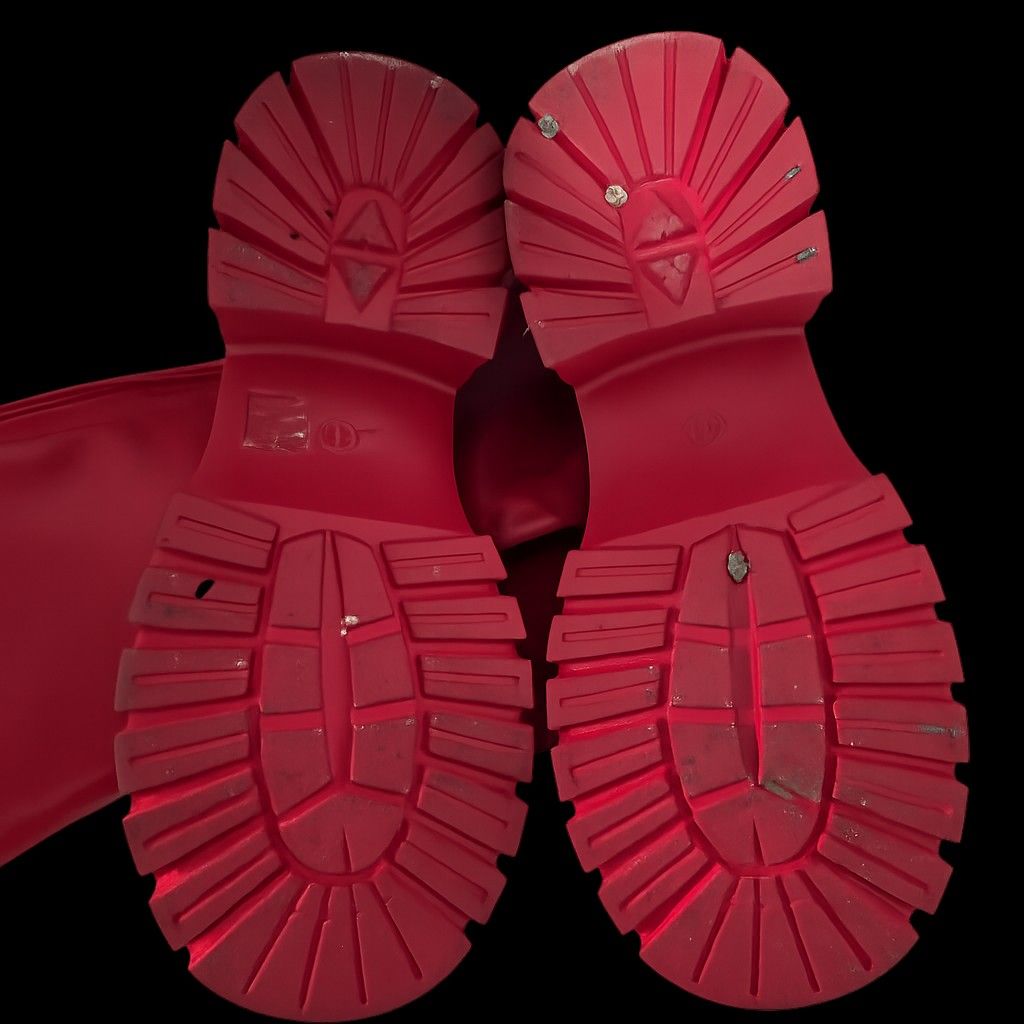 US9 Red Knee High Chunky Platform Boots (Category: Boots) located in Pasig City. Submitted by plussizedpixie (Listing ID 1442662558, Image 2). Description: - Used for 3 hours only - Bold red knee-high boots - Chunky platform sole for a statement look - Easy back zipper with decorative tassel detail - Made from faux leather material - Designed for good grip and stability - Perfect for adding flair to any outfit - Ready for their next adventure wit
