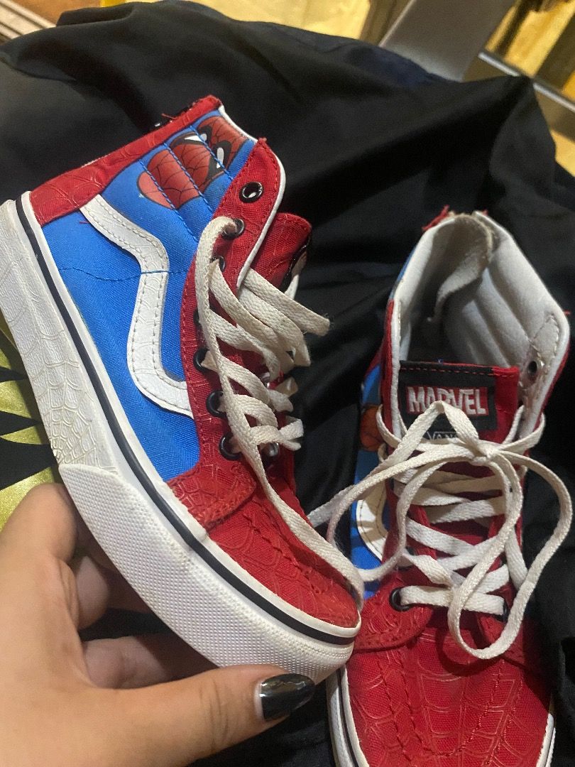 Vans x Marvel Spider-Man High-Top Sneakers (Category: Sneakers) located in Quezon City. Submitted by learose26638332 (Listing ID 1442667540, Image 1). Description: - Cool Vans high-tops with a Spider-Man theme - Classic red and blue colorway - Secure lace-up closure - Ideal for any Marvel fan - Shows some scuffing on soles and minor fabric wear -Size 32.