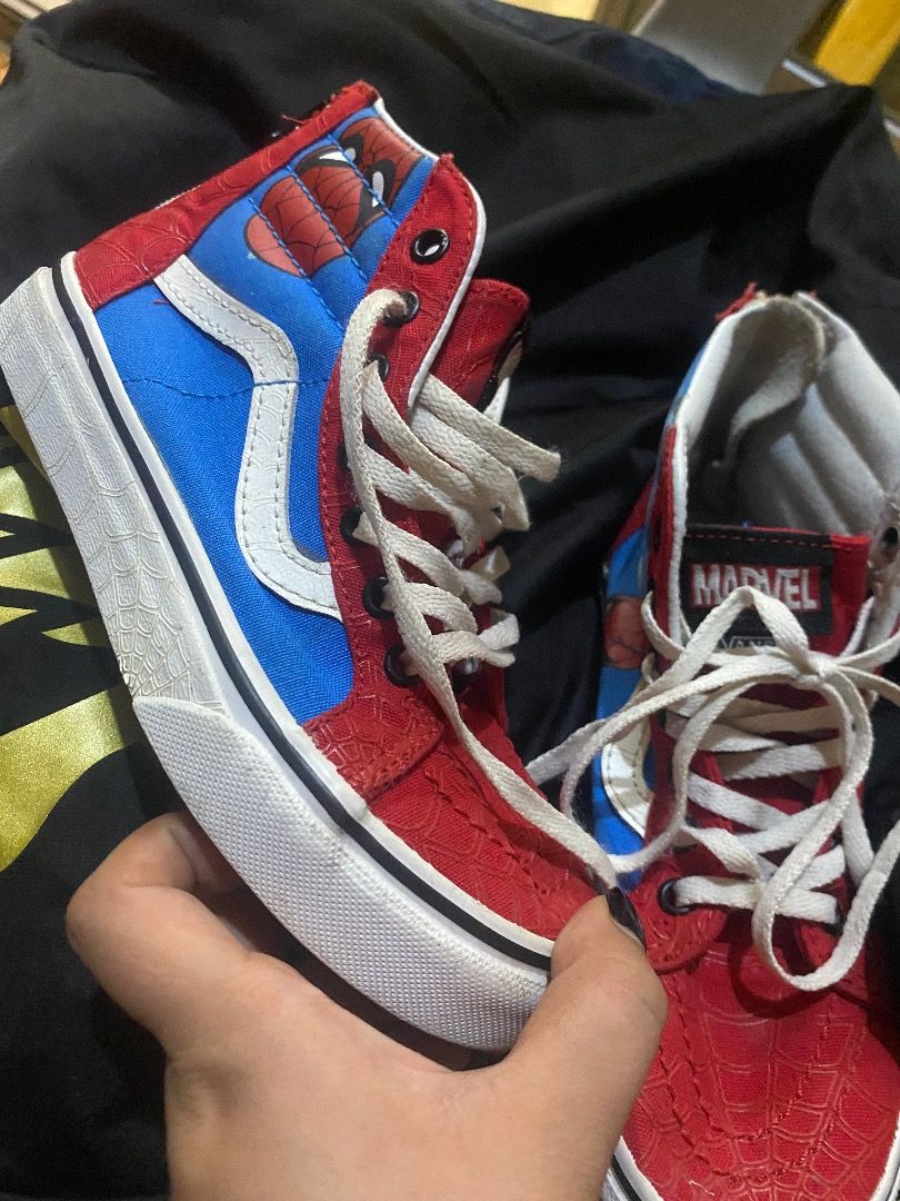 Vans x Marvel Spider-Man High-Top Sneakers (Category: Sneakers) located in Quezon City. Submitted by learose26638332 (Listing ID 1442667540, Image 2). Description: - Cool Vans high-tops with a Spider-Man theme - Classic red and blue colorway - Secure lace-up closure - Ideal for any Marvel fan - Shows some scuffing on soles and minor fabric wear -Size 32.