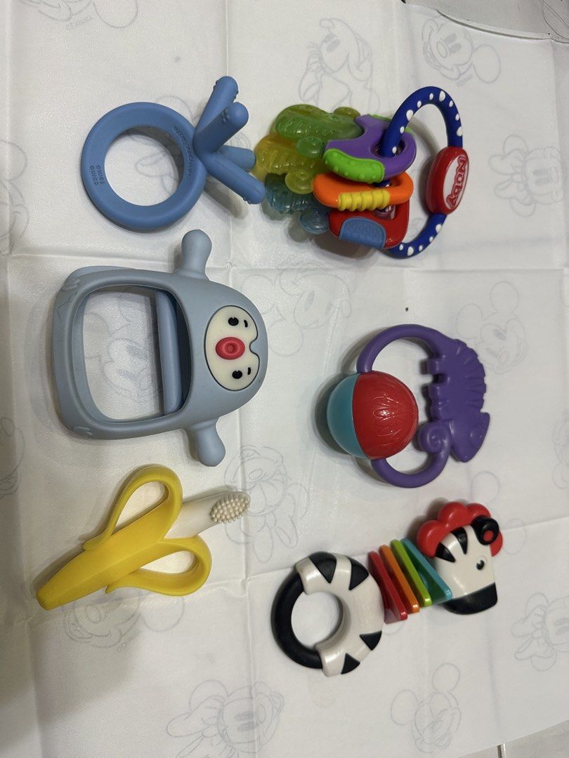 Various Toy Teethers (Category: Soothers & Pacifiers) located in Quezon City. Submitted by cocloset85 (Listing ID 1442705337, Image 1). Description: 6 pcs toy teethers 3 avent pacifier 2 extra pacifier 2 medela steam bag.