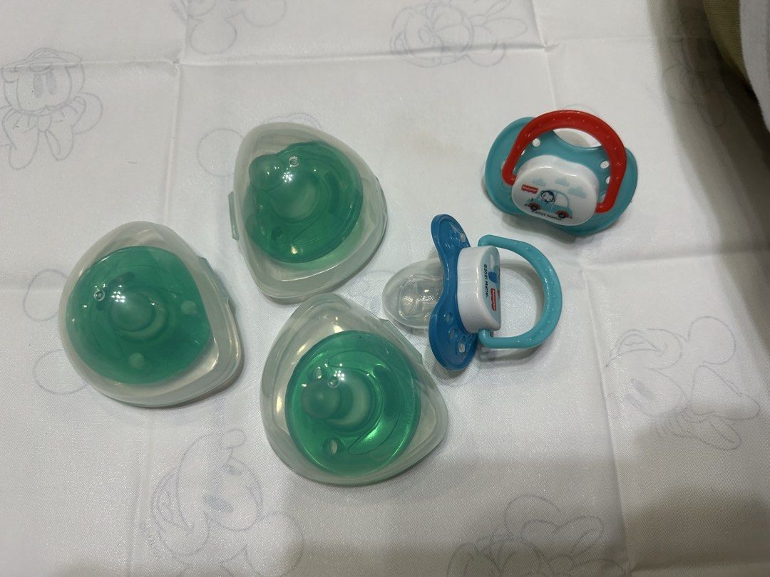 Various Toy Teethers (Category: Soothers & Pacifiers) located in Quezon City. Submitted by cocloset85 (Listing ID 1442705337, Image 3). Description: 6 pcs toy teethers 3 avent pacifier 2 extra pacifier 2 medela steam bag.