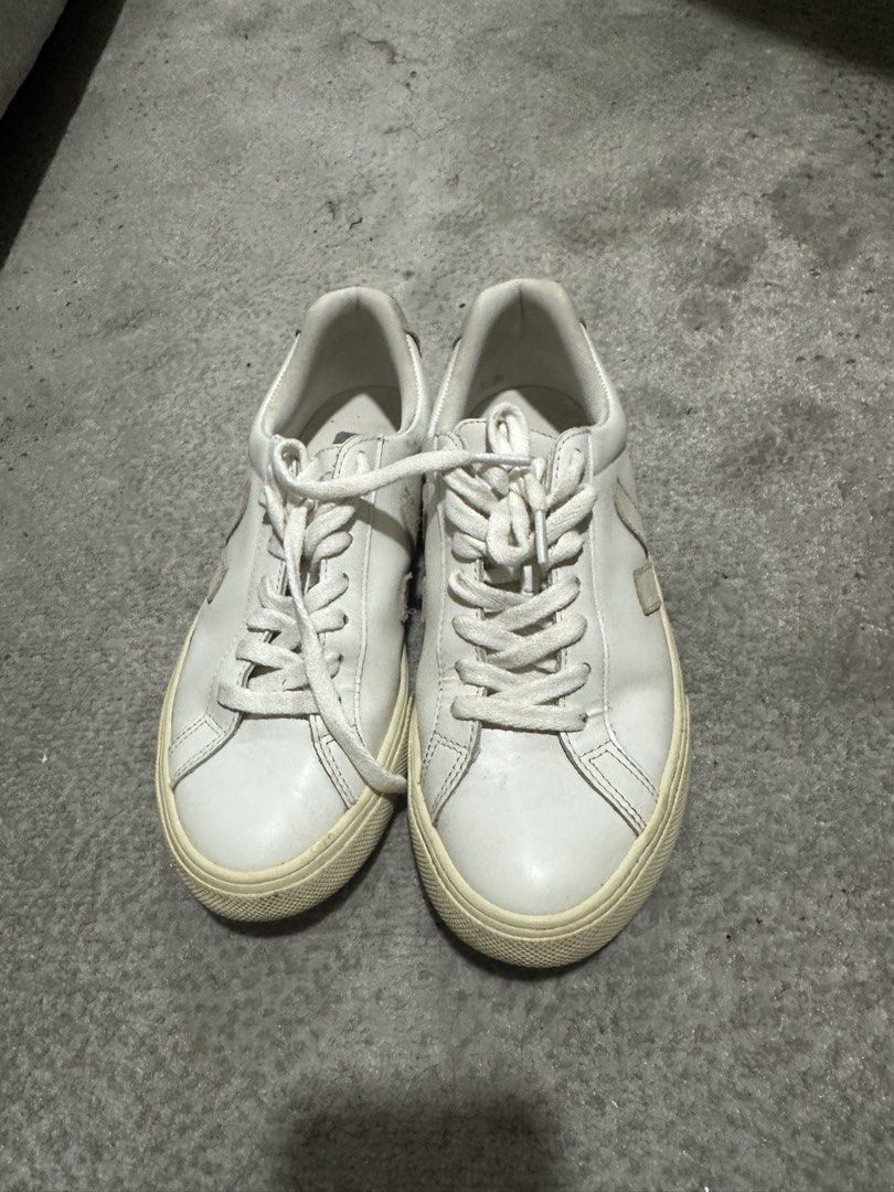 Veja Esplar Sneakers White Leather Beige Logo (Category: Sneakers) located in Taguig. Submitted by bearosari (Listing ID 1442678129, Image 1). Description: - Classic white Veja sneakers (SRP: 10K) - Beige logo detail - Low-top, lace-up style - Leather upper, rubber sole - Perfect for everyday wear - Minor signs of wear on soles and leather - Plenty of life remaining.