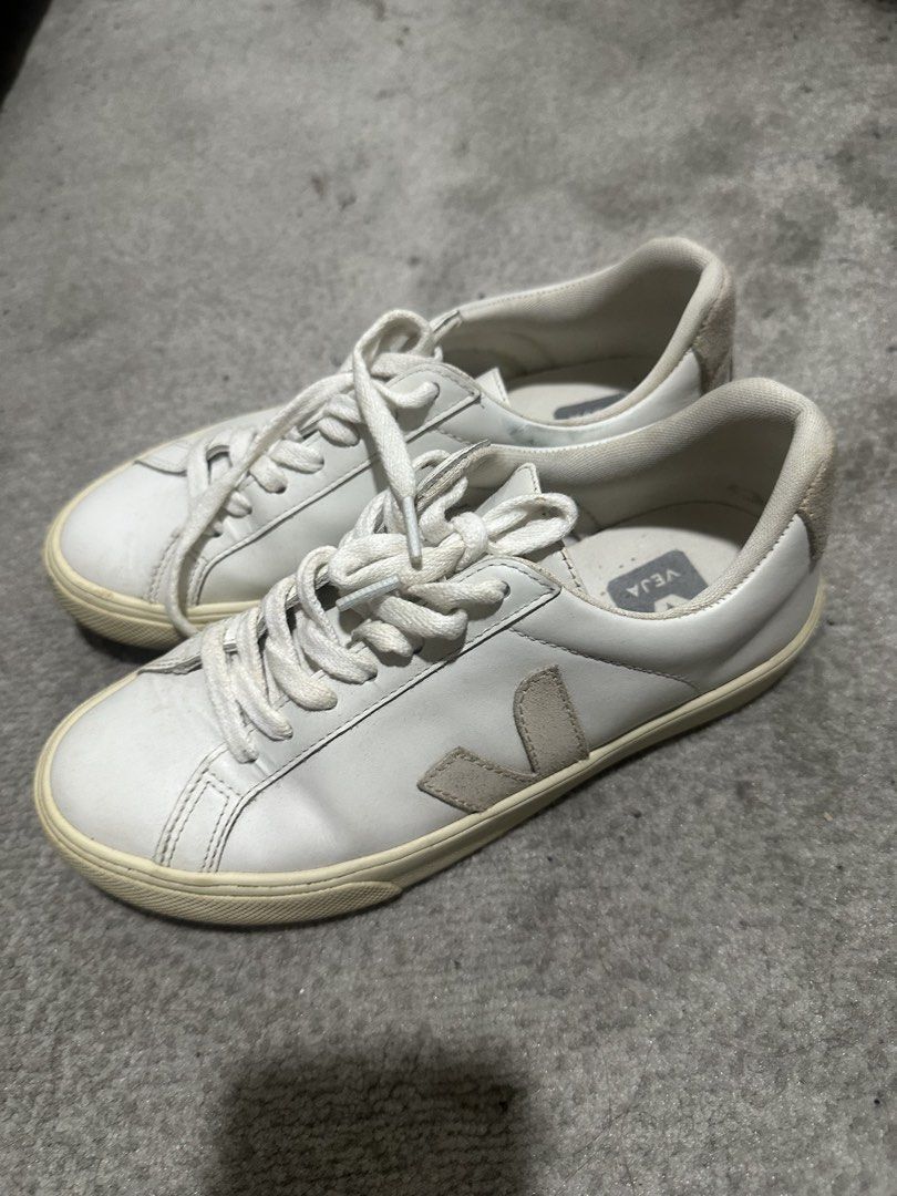 Veja Esplar Sneakers White Leather Beige Logo (Category: Sneakers) located in Taguig. Submitted by bearosari (Listing ID 1442678129, Image 3). Description: - Classic white Veja sneakers (SRP: 10K) - Beige logo detail - Low-top, lace-up style - Leather upper, rubber sole - Perfect for everyday wear - Minor signs of wear on soles and leather - Plenty of life remaining.