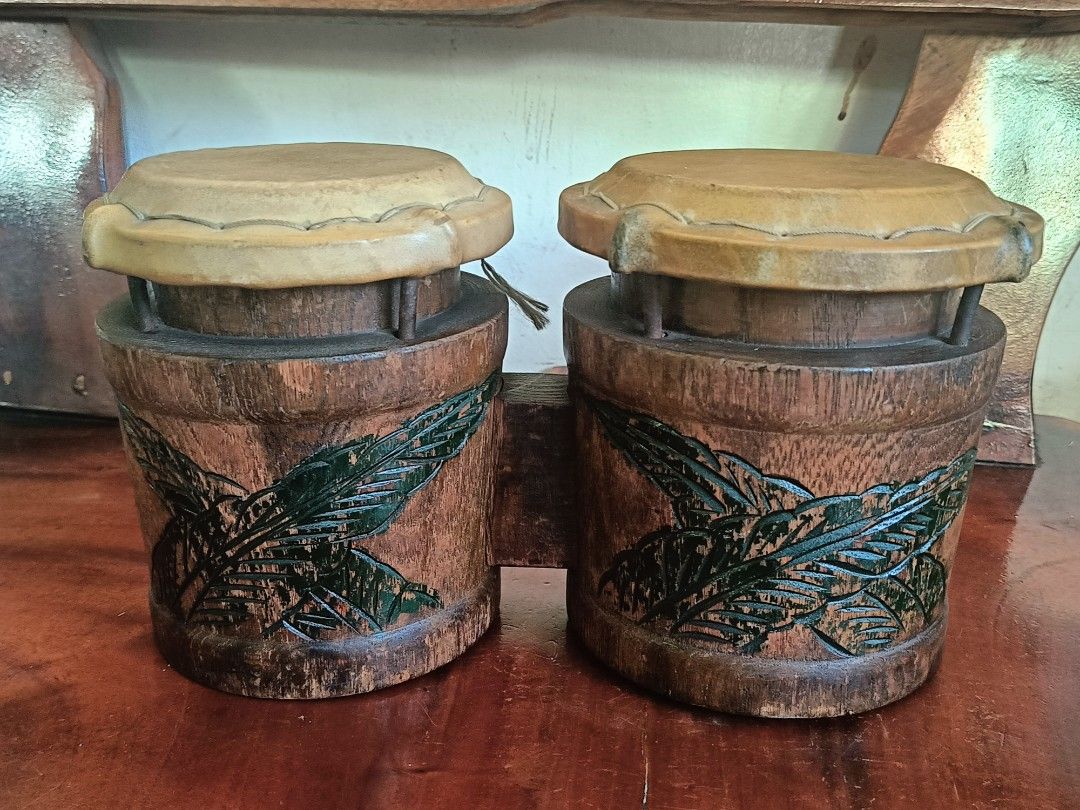Vintage Afro-Cuban Bongo Drum Percussion Instrument (Category: Musical Instruments) located in Imus. Submitted by ABrielleC (Listing ID 1442727661, Image 3). Description: Video Link https://youtube.com/shorts/n8yUJmrKd60?si=EG2rHH_NGPDcHhnL Wood Material Height-7.5in Length-13.5in Diameter-6.75in & 6in Weight - 2.4kg Japan Surplus Item First to pay Loc Imus Cavite.