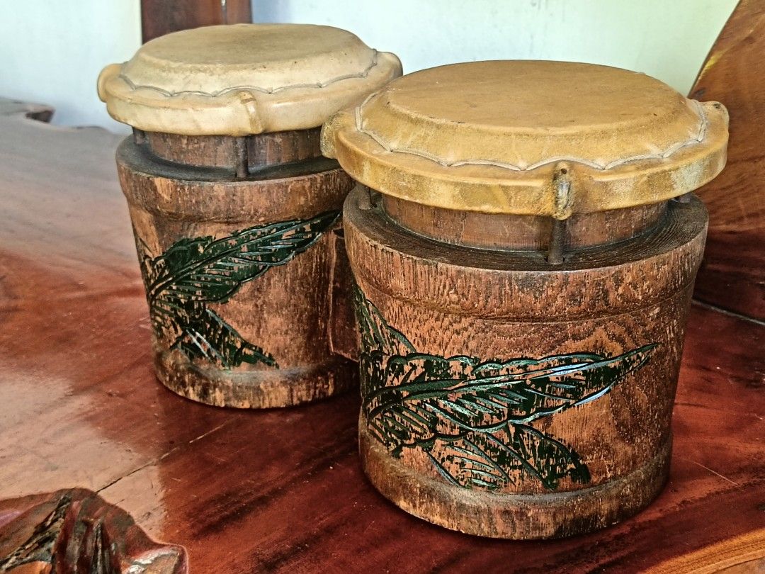 Vintage Afro-Cuban Bongo Drum Percussion Instrument (Category: Musical Instruments) located in Imus. Submitted by ABrielleC (Listing ID 1442727661, Image 2). Description: Video Link https://youtube.com/shorts/n8yUJmrKd60?si=EG2rHH_NGPDcHhnL Wood Material Height-7.5in Length-13.5in Diameter-6.75in & 6in Weight - 2.4kg Japan Surplus Item First to pay Loc Imus Cavite.