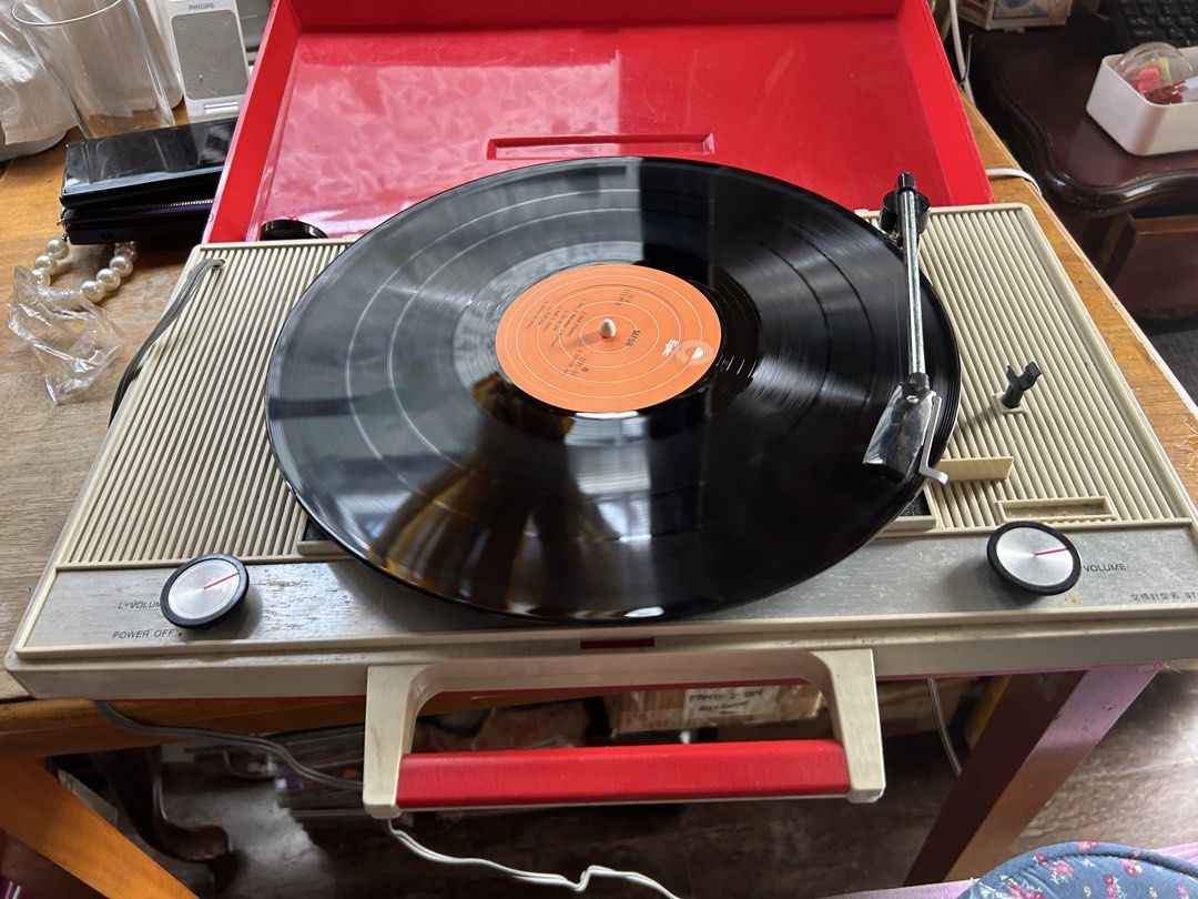 Vintage ST-7 Record Player phono 110voltz (Category: Other Audio Equipment) located in Caloocan City. Submitted by guitara1822 (Listing ID 1442699865, Image 1). Description: - Vintage ST-7 portable suitcase-style record player 110voltz made in Japan - Separate volume knobs for left and right channels - Clearly marked power off and volume controls - Ideal for retro music lovers.