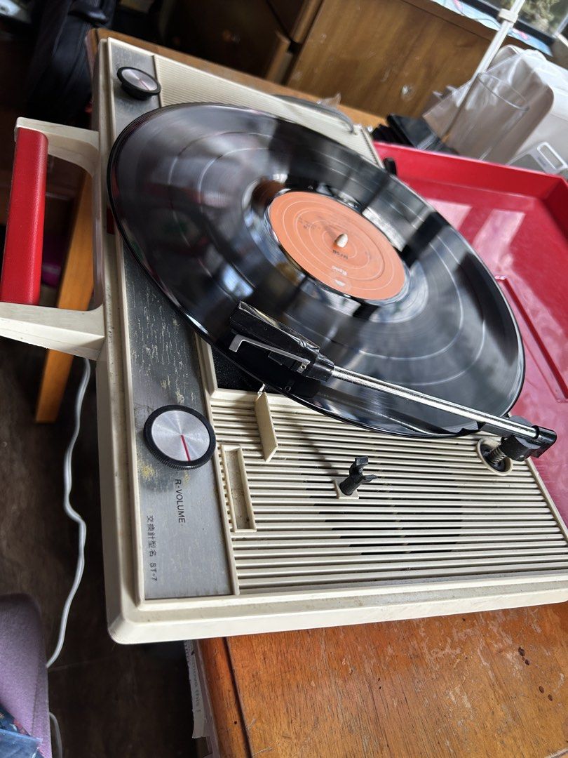 Vintage ST-7 Record Player phono 110voltz (Category: Other Audio Equipment) located in Caloocan City. Submitted by guitara1822 (Listing ID 1442699865, Image 2). Description: - Vintage ST-7 portable suitcase-style record player 110voltz made in Japan - Separate volume knobs for left and right channels - Clearly marked power off and volume controls - Ideal for retro music lovers.