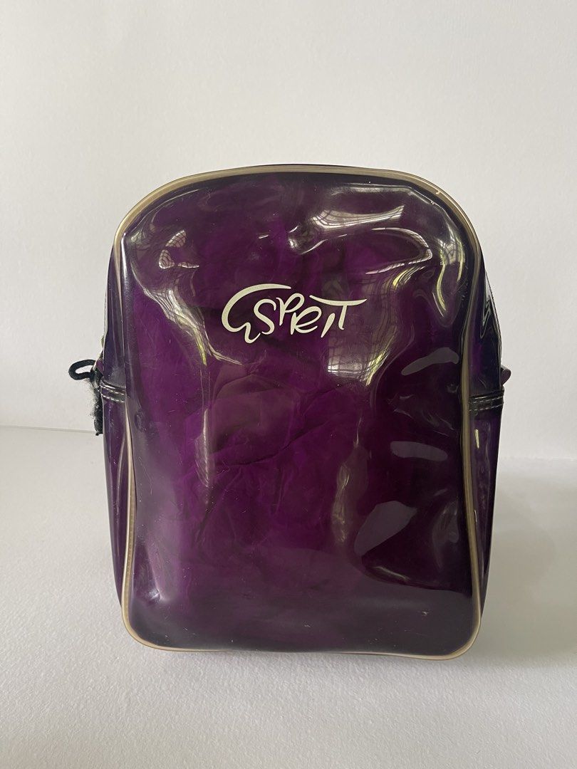 Vintage Y2K Esprit Purple Patent Mini Backpack (Category: Backpacks) located in Lucena. Submitted by secondspinph (Listing ID 1442557107, Image 1). Description: - Cute mini backpack from Esprit from the late ‘90s (personally used, pasalubong from the US) - Shiny purple patent pvc material - Adjustable straps - Front zip closure - Small size, perfect for essentials - Shows some wear on zipper pull and straps - willing to send additional pics/vids,