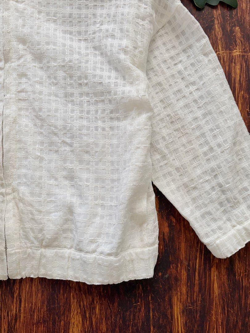 White Textured Zip-Up Jacket (Category: Coats, Jackets and Outerwear) located in Bacoor. Submitted by wornbetter.ph (Listing ID 1442601552, Image 3). Description: - White textured jacket - Zip-up front with ring pull - Elasticated hem and cuffs - Lightweight material - Ideal for layering.