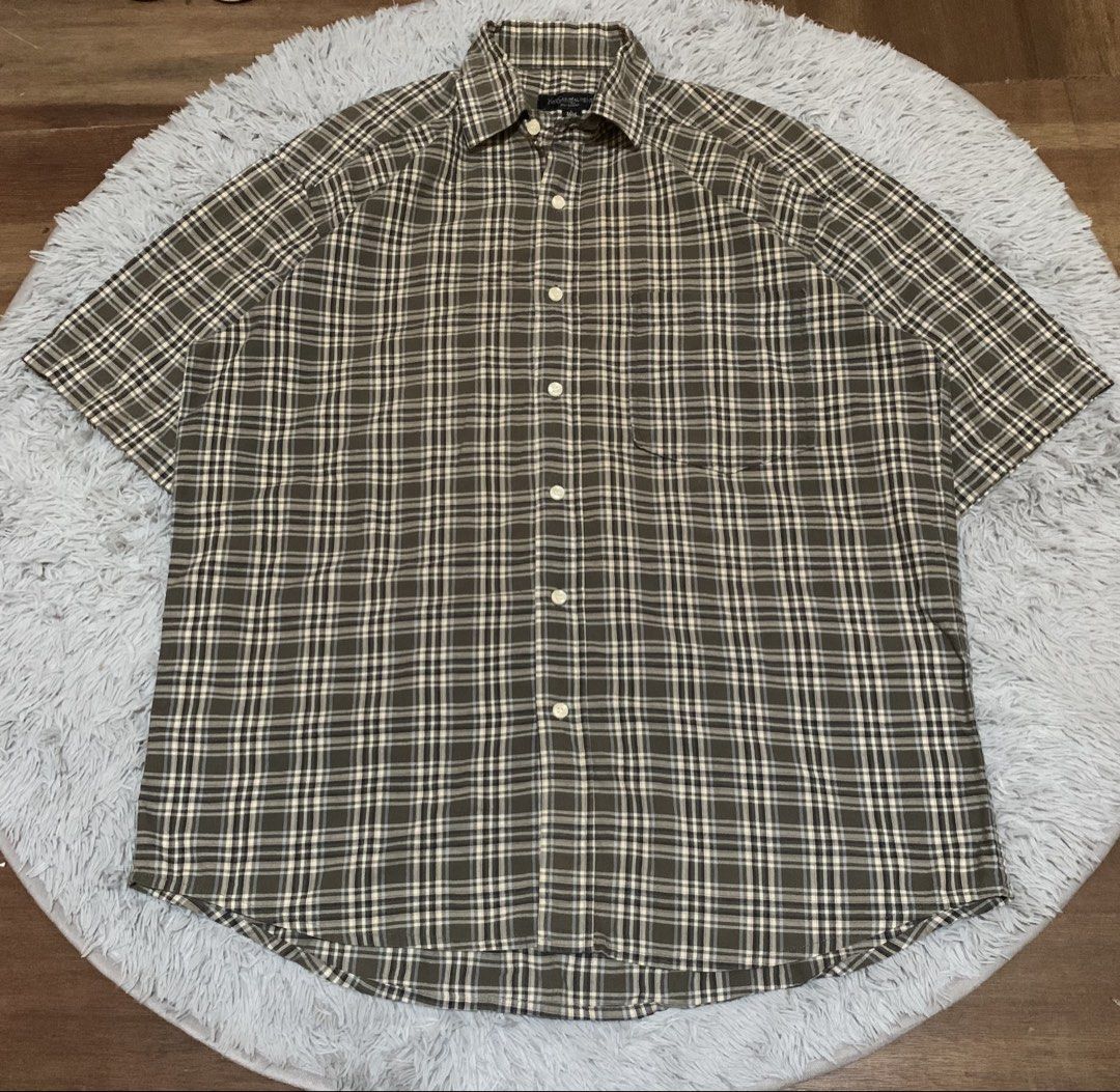Yves Saint Laurent short-sleeve button-down (Category: Luxury Apparel) located in Alcoy. Submitted by jeffalvara90142 (Listing ID 1442635308, Image 1). Description: This Yves Saint Laurent short-sleeve button-down features an olive green and yellow plaid pattern. Size : large on tag Dimes: 24/30 Condition: excellent Color rate: 8.5/10.
