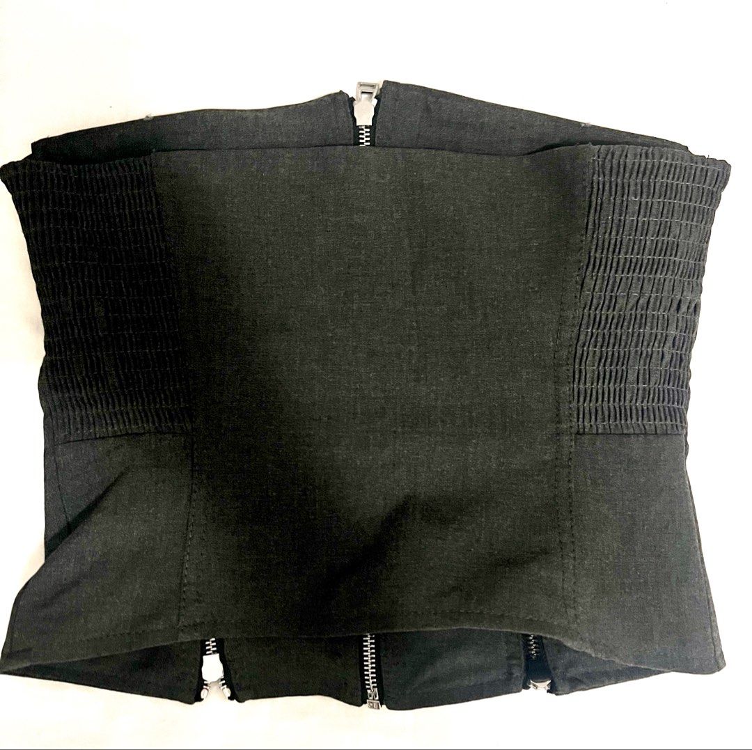 Zara Corset Top with Zippers (Category: Others Tops) located in Makati City. Submitted by g.ang.s (Listing ID 1442652223, Image 3). Description: - Zara dark grey corset top - Features multiple zippers on the front and sides - Smocked panels on the back for a snug fit - Unique, edgy design - Perfect for layering or wearing solo.