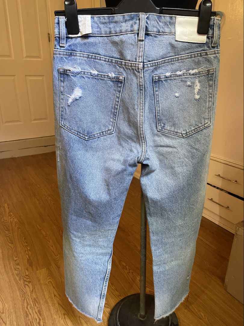 ZARA lightwash distressed denim jeans (Category: Jeans) located in Cebu City. Submitted by nerine888 (Listing ID 1442447209, Image 2). Description: Great casual pair of jeans. Used a few times and still like it's good as new Button Fly/Multi-button (not zipper) Please see pics for measurements.