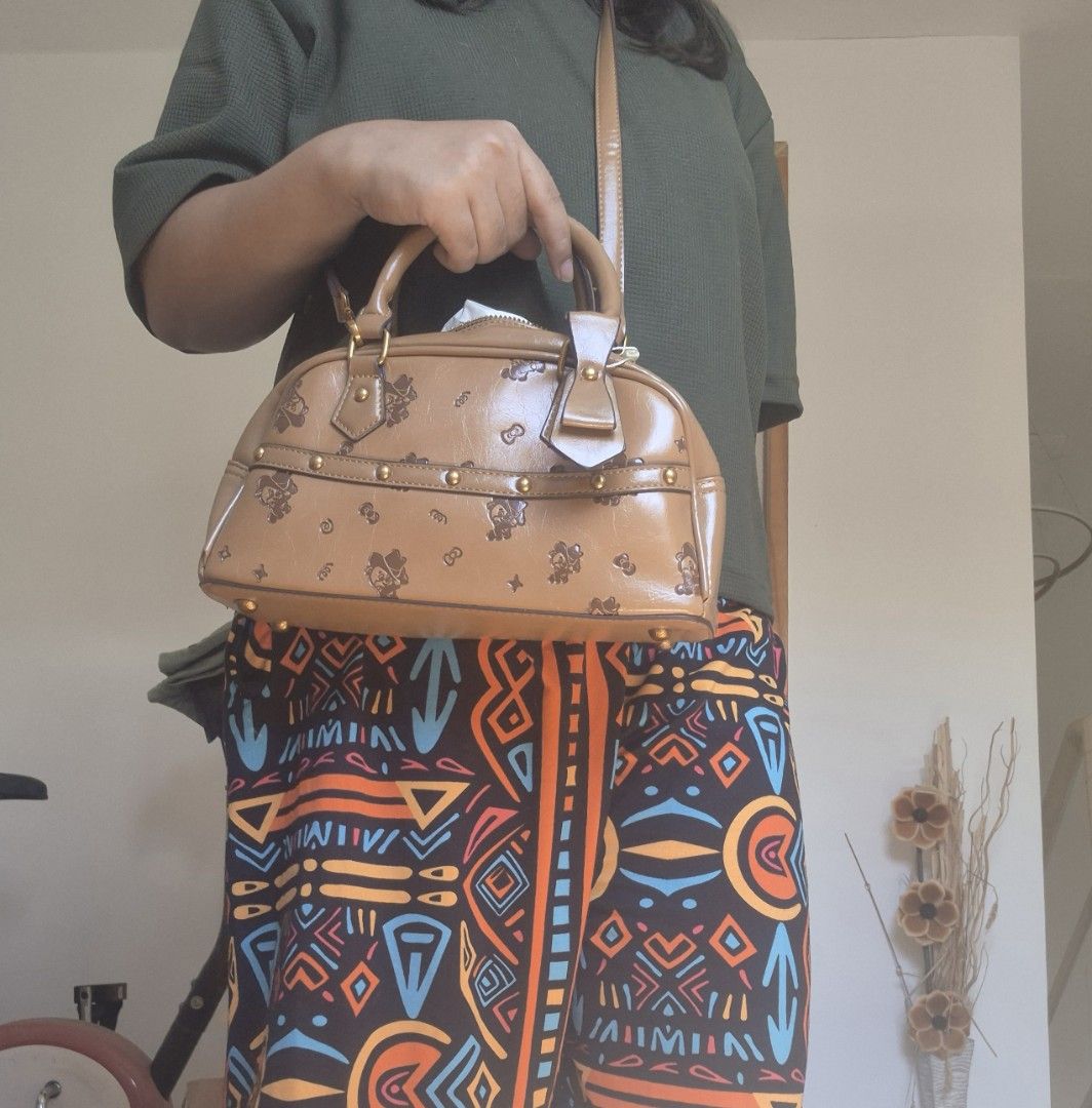 Zhuo MICKEY Brown Monogram Satchel Bag (Category: Luxury Bags & Wallets) located in Davao. Submitted by wangcollections (Listing ID 1441064828, Image 3). Description: - Size: Semi medium - Brand new never used - Brown satchel bag.