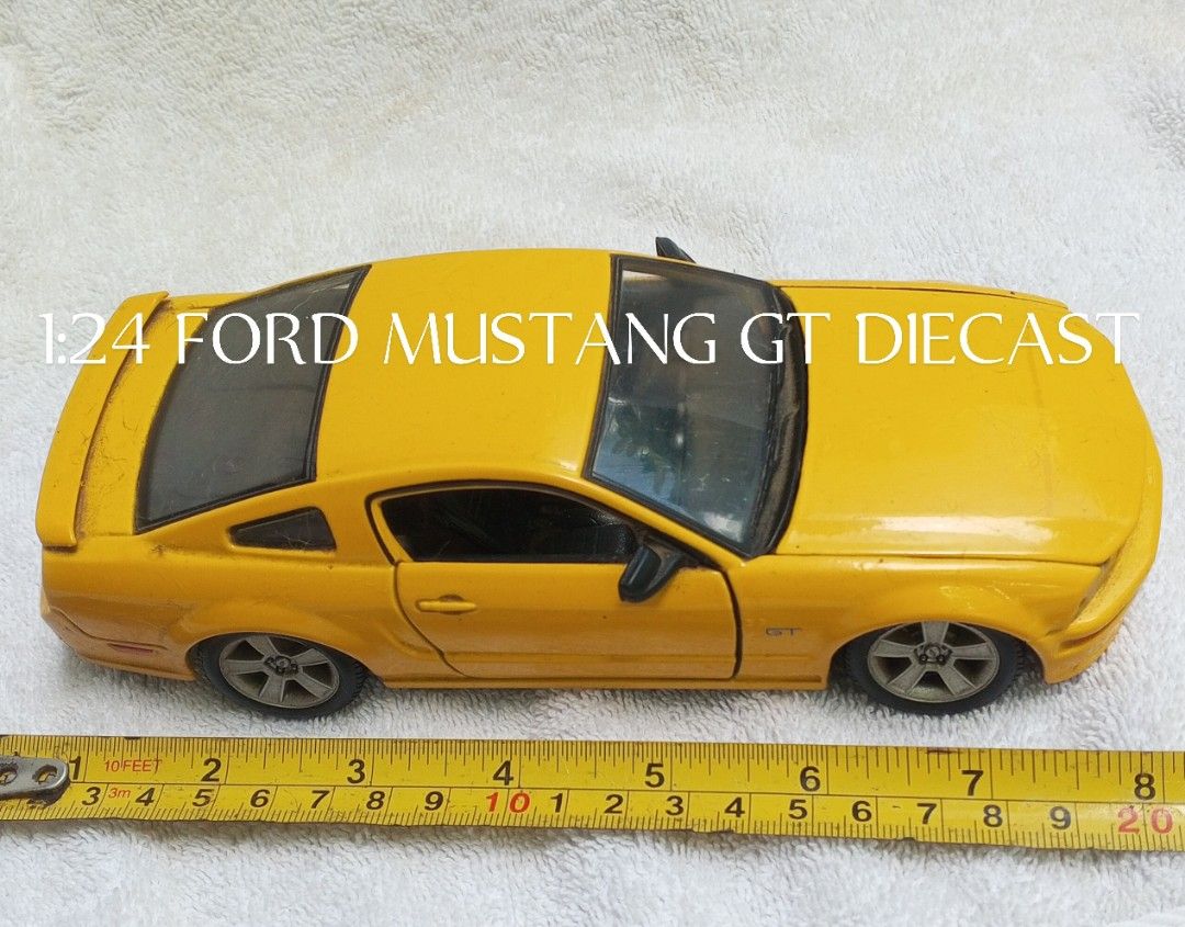 1:24 DIECAST MUSTANG GT (Category: Vehicle & Diecast Models) located in Quezon City. Submitted by jeandevera (Listing ID 1442811747, Image 1). Description: one in list.