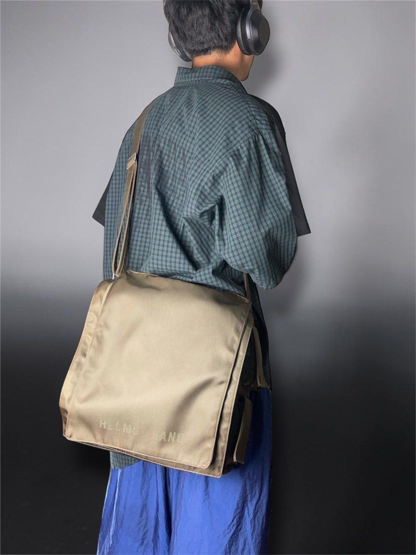 1999 Helmut Lang nylon cargo pockets messenger bag (Category: Activewear) located in Manila. Submitted by killzarchival (Listing ID 1442735431, Image 2). Description: 1999 Helmut Lang nylon cargo pockets messenger bag *Condi:7/10 *Has some light discoloration on the opposite side of the front flap area which isnt really visible but overall the bag itself is in great condition Size:OS Width:13 inches Height:16.
