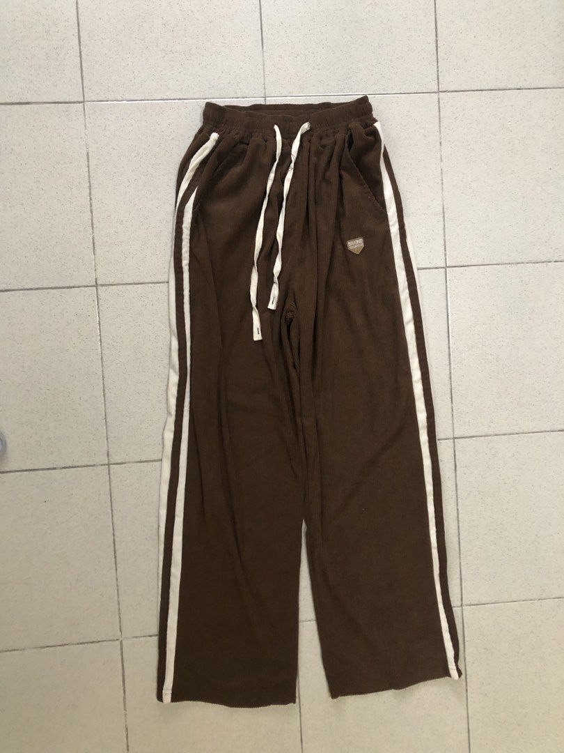 4-in-1 casual pants and skirts bundle (Category: Other Bottoms) located in Cainta. Submitted by mikeeturano (Listing ID 1442796516, Image 2). Description: Bundle of 4 casual wear pants and skirt ‼️ - Includes Brown wide-leg pants with white stripes, Grey joggers with elastic waist and cuffs, Long brown skirt with lace trim, Tan A-line skirt with button front - Best fits medium to large frames - Can send more pictures of each item upon request - R