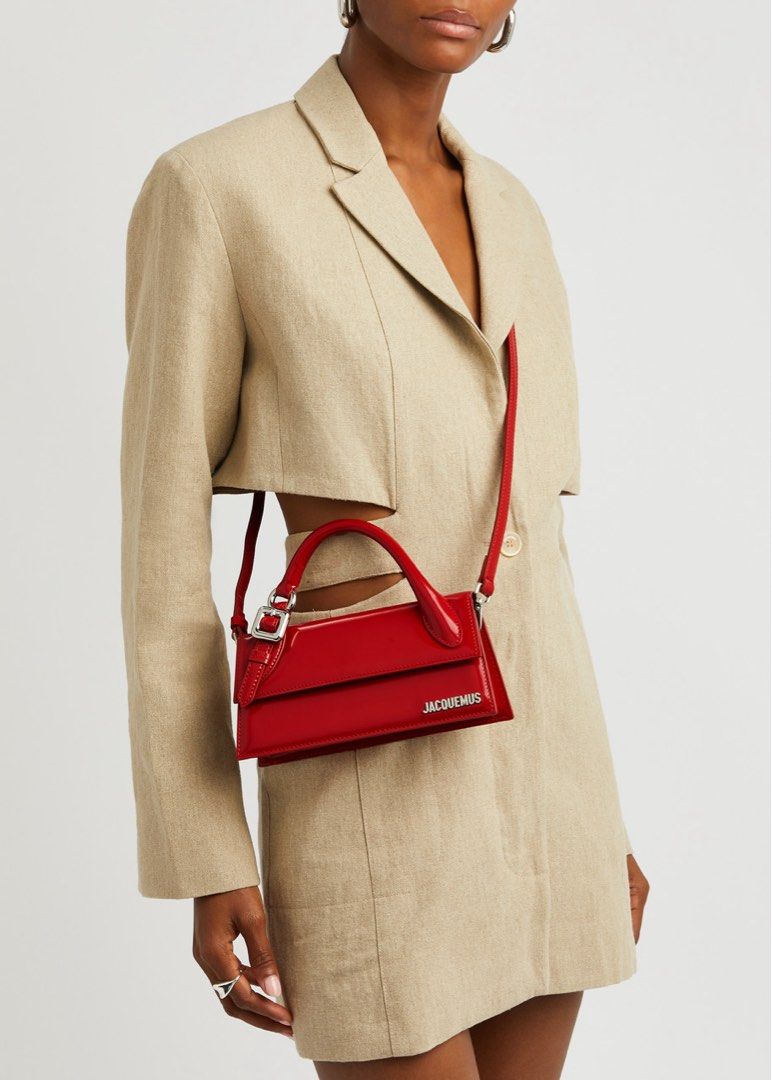 🍒 Jacquemus Le Chiquito Long Red Bag (Category: Luxury Bags & Wallets) located in Manila. Submitted by designerarchives.ph (Listing ID 1442730923, Image 2). Description: - patent leather shoulder bag ACTUAL PHOTOS are uploaded. Photos were taken from buyer’s previous order. Preorder •Eta: 10 days •50% dp required •Buyer will shoulder local sf Shipping: NCR - Grab/Lalamove Provincial - LBC.