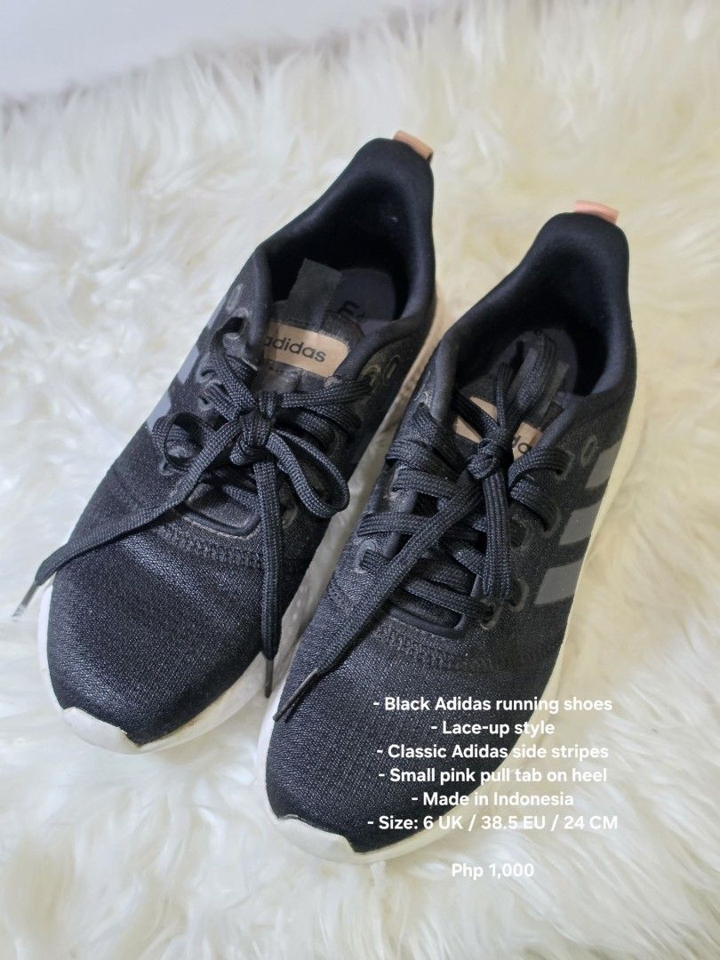 Adidas Black Running Shoes (Category: Sneakers) located in Mandaluyong City. Submitted by hellokrissel (Listing ID 1442762664, Image 2). Description: - Black Adidas running shoes - Lace-up style - Classic Adidas side stripes - Small pink pull tab on heel - Made in Indonesia - Size: 6 UK / 38.5 EU / 24 CM.