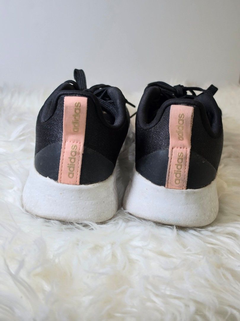 Adidas Black Running Shoes (Category: Sneakers) located in Mandaluyong City. Submitted by hellokrissel (Listing ID 1442762664, Image 3). Description: - Black Adidas running shoes - Lace-up style - Classic Adidas side stripes - Small pink pull tab on heel - Made in Indonesia - Size: 6 UK / 38.5 EU / 24 CM.