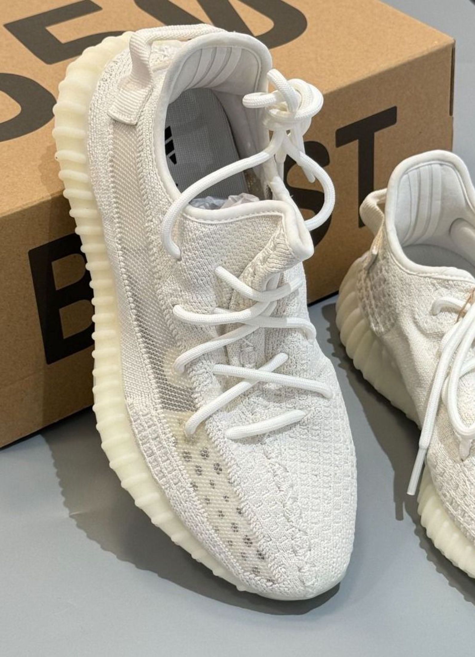 Adidas originals Yeezy Boost 350 V2 Ice Cream Bone Life Shoes White (Category: Sneakers) located in Singapore. Submitted by livefishxxd (Listing ID 1442769287, Image 1). Description: 🔒 Safe & Easy Adidas | Adidas originals Yeezy Boost 350 V2 Ice Cream Bone Life Shoes White Condition: Brand New Shipping: Free (J&T/Ninja Van) Payment: Cash on Delivery Confirm: ~3 day photos Protection: Buyer Protection.