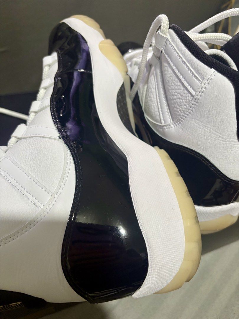 Air Jordan 11 "Concord" Retro (Category: Sneakers) located in Manila. Submitted by majregio (Listing ID 1442769508, Image 2). Description: - Classic Air Jordan 11 "Concord" sneakers - White leather upper - Iconic black patent leather mudguard - Translucent outsole - Comes with original box - Ideal for collectors and sneakerheads.