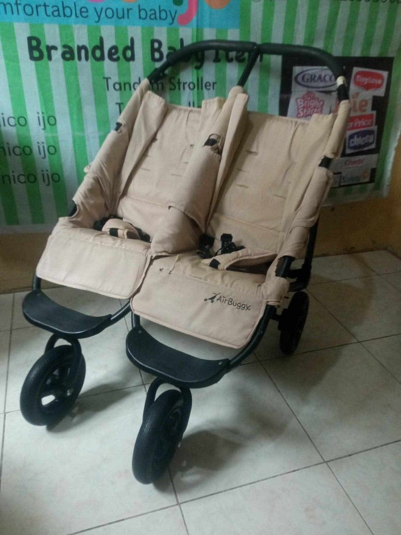 Air-Buggy Tandem Stroller (Category: Strollers) located in Caloocan City. Submitted by Unicoijo02 (Listing ID 1442746205, Image 1). Description: - Air-Buggy tandem stroller in beige - Ideal for twins or siblings close in age - Effortless maneuverability - Comfortable padded seats - Secure 5-point safety harness - Convenient folding for storage - Feel free to ask any questions!.