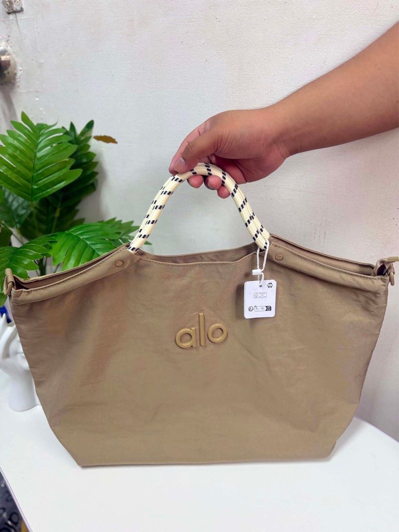 Alo 2way Bag (Category: Shoulder Bags) located in Quezon City. Submitted by stuffs.hellyy (Listing ID 1442797065, Image 2). Description: 2way bag ( hand bag & Sling bag) with tags and ziplock pouch .