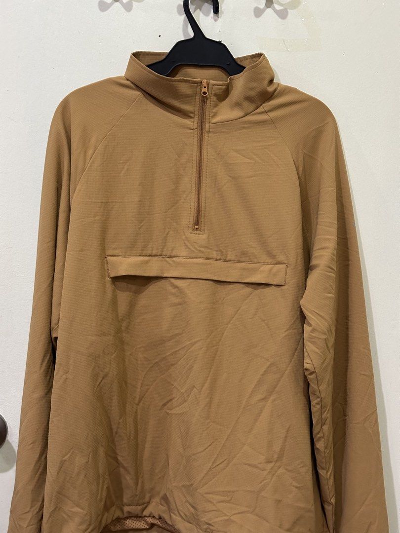 Alo Long Sleeve Quarter Zip Pullover Jacket Tan Unisex (Category: Coats, Jackets and Outerwear) located in Manila. Submitted by roseluxuryitems (Listing ID 1442897726, Image 1). Description: - Alo tan quarter zip pullover jacket - Long sleeves - Front kangaroo pocket - Mesh lining inside the collar - Ideal for layering or wearing on its own - Versatile for any activity.