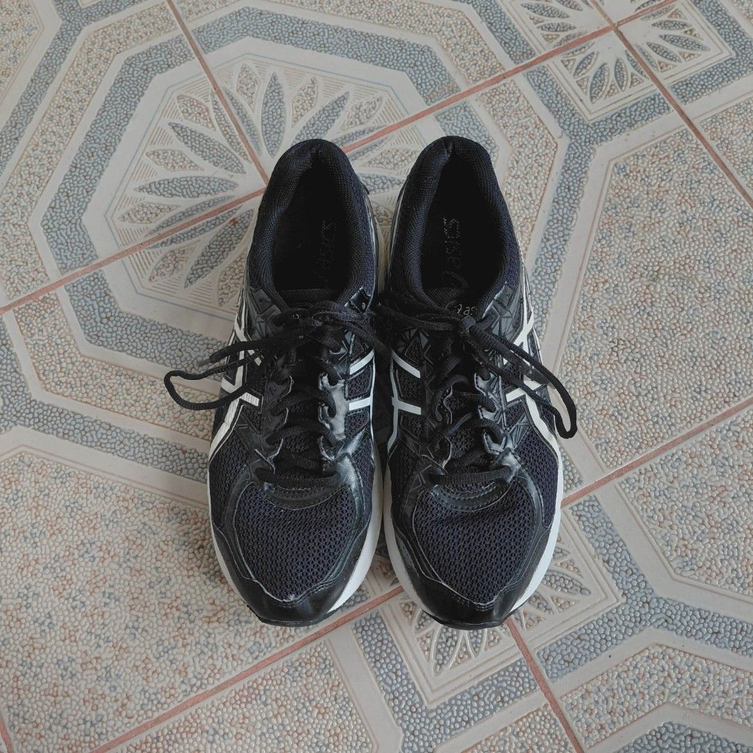ASICS GEL-EXALT 3 Running Shoes (Category: Sneakers) located in Danao, Cebu. Submitted by thriftmini88932 (Listing ID 1442732357, Image 2). Description: - ASICS GEL-EXALT 3 running shoes - Color: Dark blue with white accents - Features breathable mesh upper - Ideal for running or everyday wear - Soles show some wear, but plenty of life remaining - Please check photos for detailed condition.