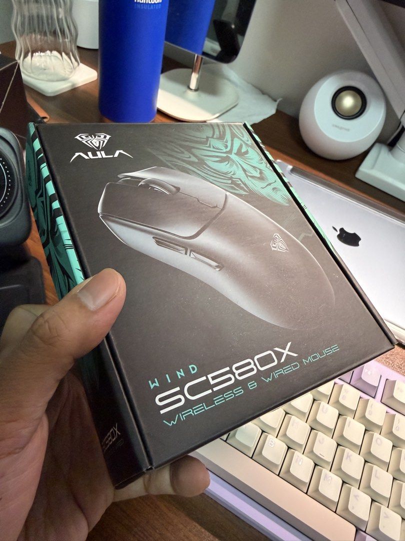 AULA WIND SC580X Wireless & Wired Gaming Mouse (Category: Mouse & Mousepads) located in Manila. Submitted by zeven_finds (Listing ID 1442884194, Image 2). Description: - AULA WIND SC580X Gaming Mouse - Color: Black - Connectivity: Wireless and Wired - Ideal for: Gaming and everyday use - Includes original box.