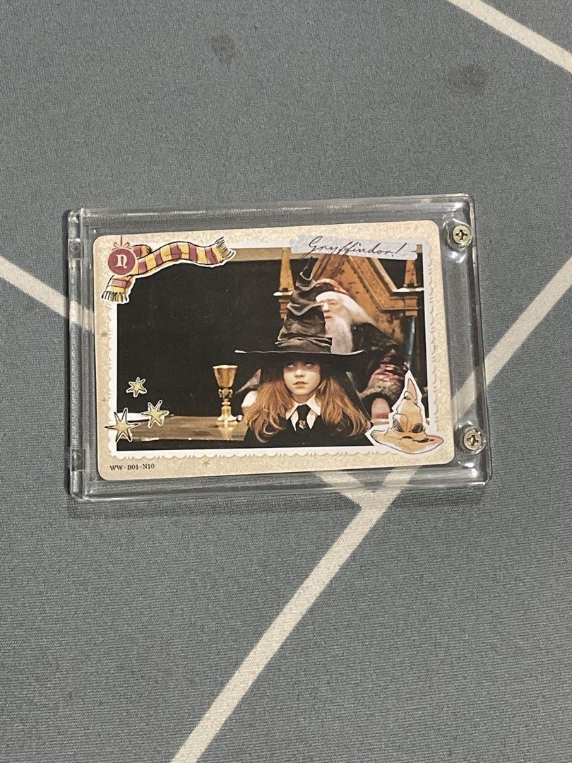 Authentic Hermione Granger Kayou Card (Category: Vintage Collectibles) located in Manila. Submitted by prelovedpicksph (Listing ID 1442900248, Image 1). Description: - in good condition, no flaws - authentic Kayou card - depicts Hermione Granger with the sorting hat - placed in an acrylic display case/protector.