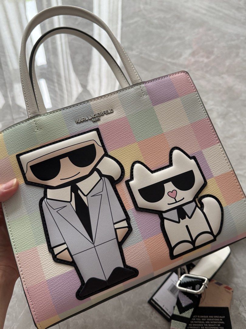 Authentic Karl bag (Category: Luxury Bags & Wallets) located in Valenzuela. Submitted by iamjackee (Listing ID 1442758622, Image 1). Description: Like New. Nagamit once lang sa mall. Complete with tag. Please check photos May maliit na mark, nung binili ko sa us preorder meron na sya.. Rfs: not my style.