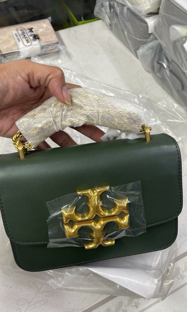 Authentic Tory Burch bag emerald green (Category: Luxury Bags & Wallets) located in Manila. Submitted by authenticbagswatchesco (Listing ID 1367584770, Image 1). Description: NEW ARRIVAL 💐Authentic Tory Burch 💐 ❌Before₱4,650 each +SF ✔️Now₱4,950 + sf 📌 with dustbag, paperbag (hindi pwede isabay ng ship sa watch) 📌Courier ( LBC).