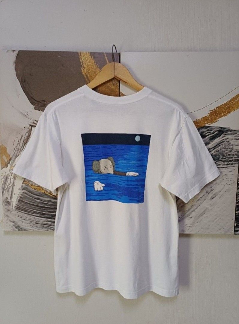 AUTHENTIC UNIQLO KAWS UNISEX SHIRT (Category: Activewear) located in Manila. Submitted by bvnnie (Listing ID 1442648376, Image 2). Description: Actual size using inches Armpit to Armpit/ 20.5 Lenght/27 fittings is Large Women, Medium in men Excellent Condition, Issue:0 Message if you have any other question about sizing. We do shipping nation wide I'm also open for video call so that you can see the item you 're interested to buy. Courier, DHL, J