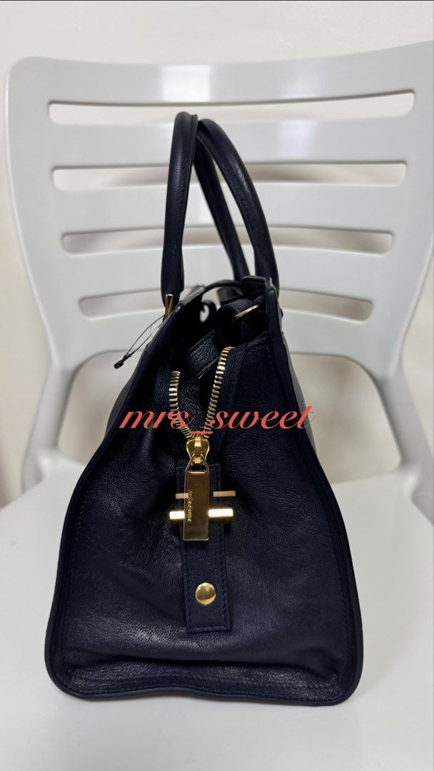 Authentic YSL small cabas (Category: Luxury Bags & Wallets) located in Valenzuela. Submitted by mrs_sweet (Listing ID 1442851349, Image 2). Description: Guaranteed authentic, bought in Japan years ago. Kept but never used. .